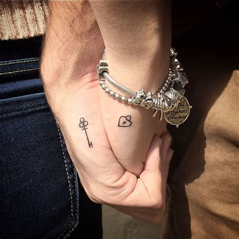 Matching Tattoos For Siblings. . Symbolic tattoo de parejas